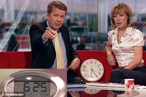 Back in time Bill Turnbull and Sian Williams sit between an old clock 